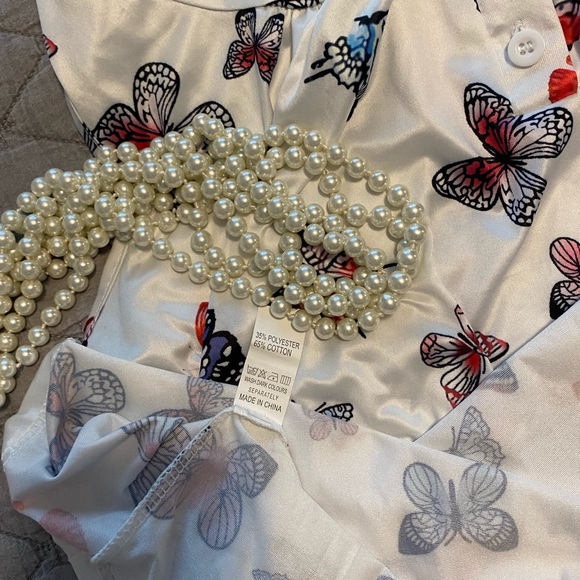 Butterfly blouse for spring or summer. Would pair nicely with a cardigan. - Picture 3 of 3